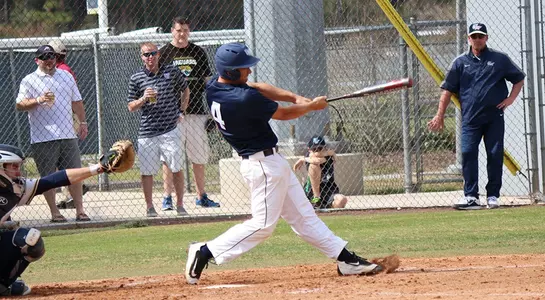 Alex Merrit swinging the bate