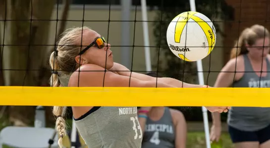 UNF each volleyball player makes a bump pass