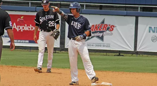 Brooks pointing to the dugout