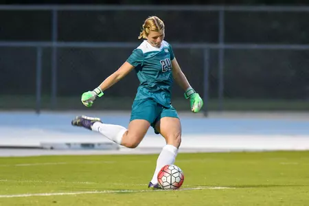 UNF women's soccer goalie strikes the ball