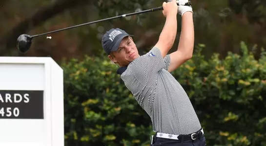 Michael Saccente follows through off the tee