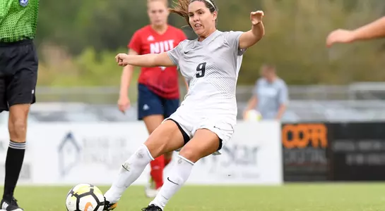 Lisa Cedeno kicks the ball.