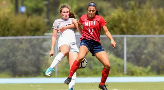 Hannah Menendez steals the soccer  ball from her opponent.