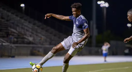 AJ Williams fields the soccer ball at Hodges Stadium.