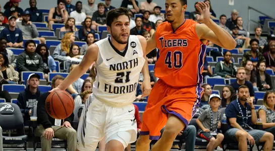 Ivan Gandia-Rosa dribbles the baseline against Edward Waters