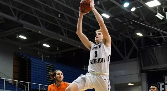 Noah Horchler jumps up to dunk the ball