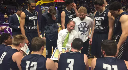 Team huddle photo from game at LSU