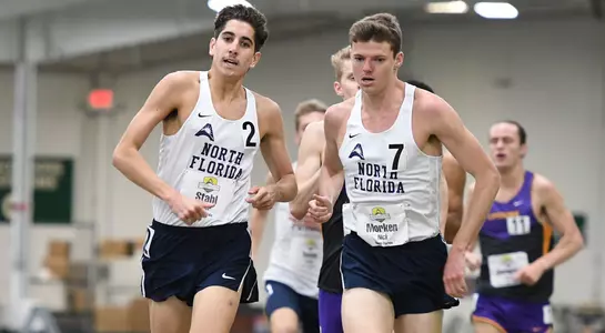 Tyler Stahl and Nick Morken battle each other to the finish line of the Mile race at the 2017 ASUN Indoor Championship