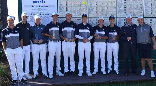The UNF men's golf team poses with their trophy after winning the team title at 2017 The Hayt Invitational