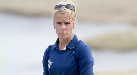 Head coach Joanne Berglund watches over one of her players in action