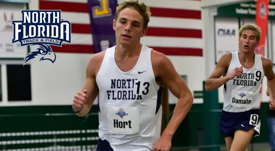 Brad Hort and Michael Damato race to the finish line at the Camel City Invitational