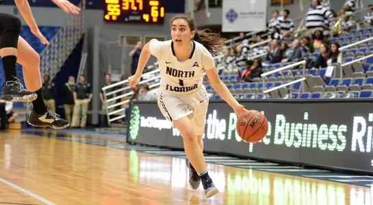 Ioannidis dribbles up the basketball court
