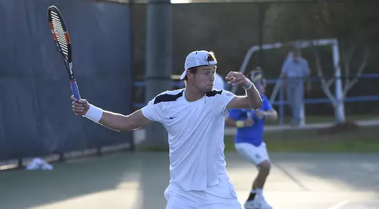 Muscheites returns a ball during a match.
