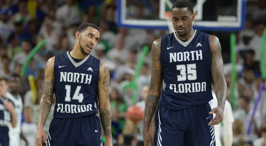 Dallas Moore and Chris Davenport walk off the court in the final game as Ospreys