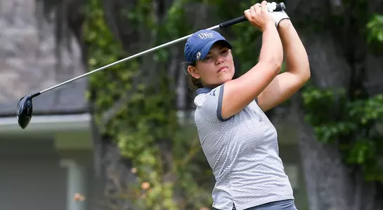 Nathalie Nygren finishes her golf swing