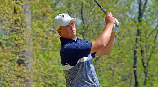 Dillon Woods watches the ball after he hits a shot