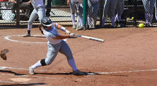 Jenna Brownell hits against St. Joe's to end USF Series Weekend.