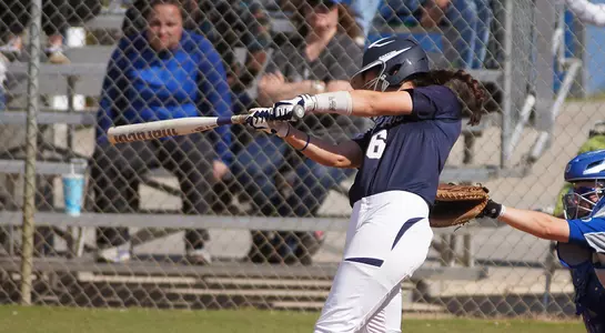 Minnie Cocuzza sends a single into the field