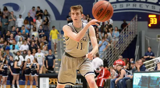 Garrett Sams makes a pass to a teammate at UNF Arena