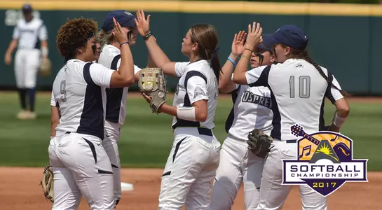 UNF infield huddles after making an out.