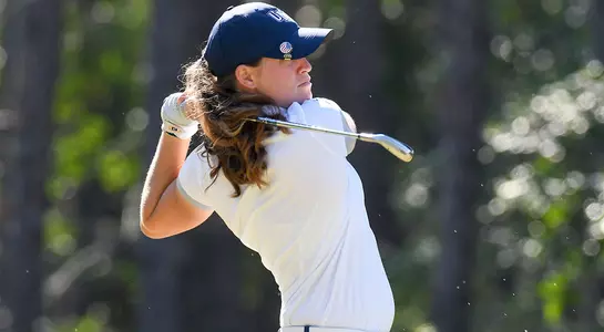 Courtney Cobb hits tee shot