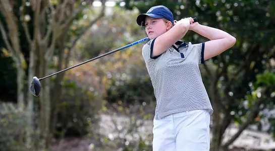 Teresa Conroy hits a tee shot
