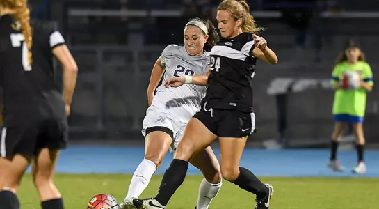 Kelli Crowley steals soccer ball from Wofford player