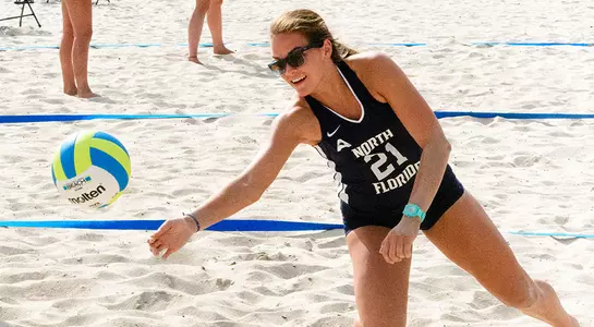 Madilyn McCarty dives for the volleyball