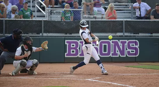 Alex Arciola hits the softball
