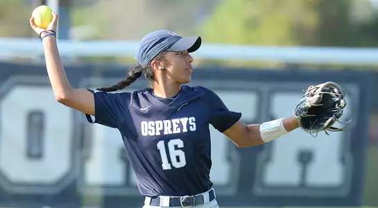 Casey Estes throws the softball