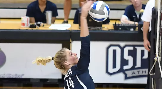 Taryn Griffey spikes the volleyball