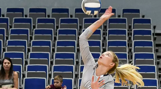 Taryn Griffey spikes the volleyball