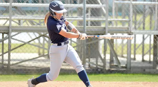 Macayla Kelley hits the softball