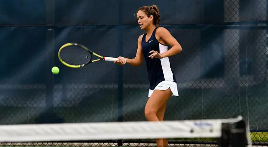 Lucia Montano hits the tennis ball