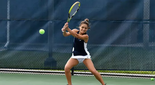 Lucia Montano hits the tennis ball