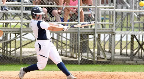 Mary Rodriguez hits the softball