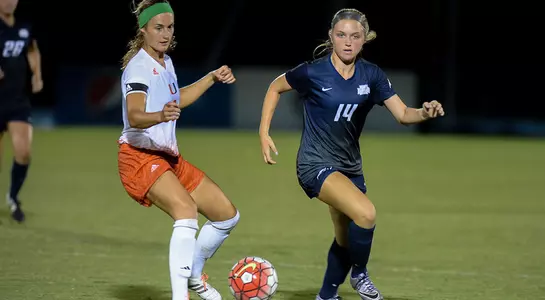 Angelica Stege steals soccer ball from Miami player
