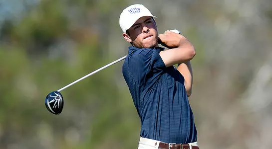 Jordan Batchelor hits a tee shot