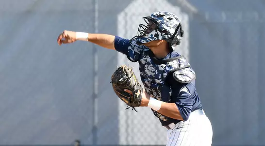 Rey Gonzalez throws the baseball to second base