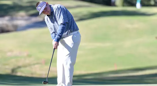 Michael Mattiace hits a putt