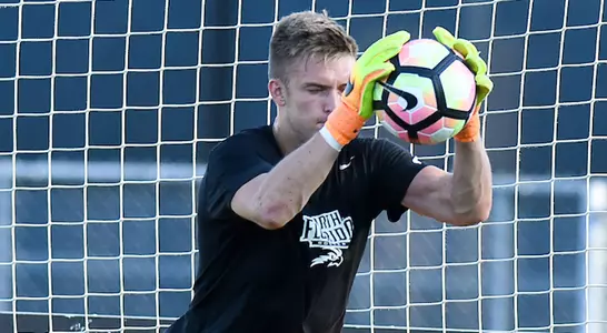 Tord Pedersen catches the soccer ball