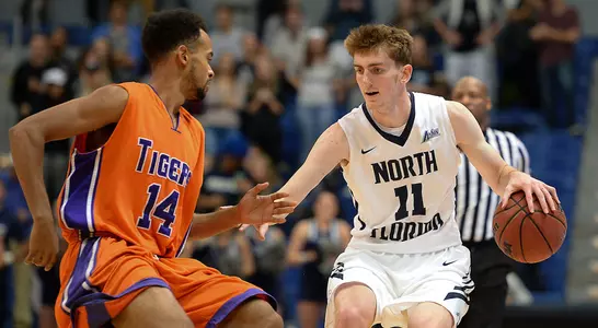 Garrett Sams dribbles past an opponent