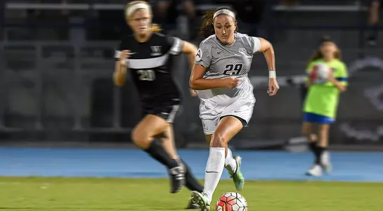 Kelli Crowley attacks the ball against Wofford in 2016