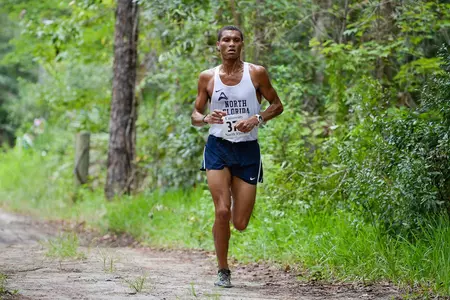 Rayford James runs on trail of UNF XC Course