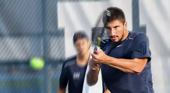 Jefta Kecic returns the tennis ball