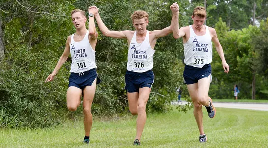 UNF trio of Fynn Timm, Noah Perkins and Nick Morken cross finish line side-by-side at UNF XC Invitational
