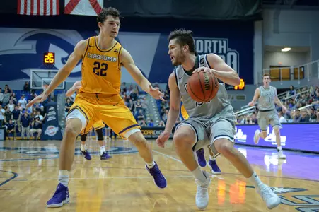 Ivan Gandia-Rosa drives the ball baseline against Lipscomb