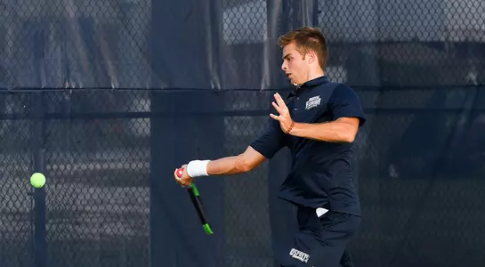 Nilo Duarte returns a forehand ball at the tennis courts.
