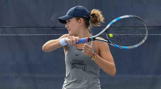 Constanza Gorches follows through after returning the tennis ball.