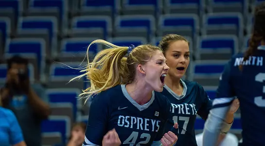Taryn Griffey gets fired up after a point during a volleyball match.